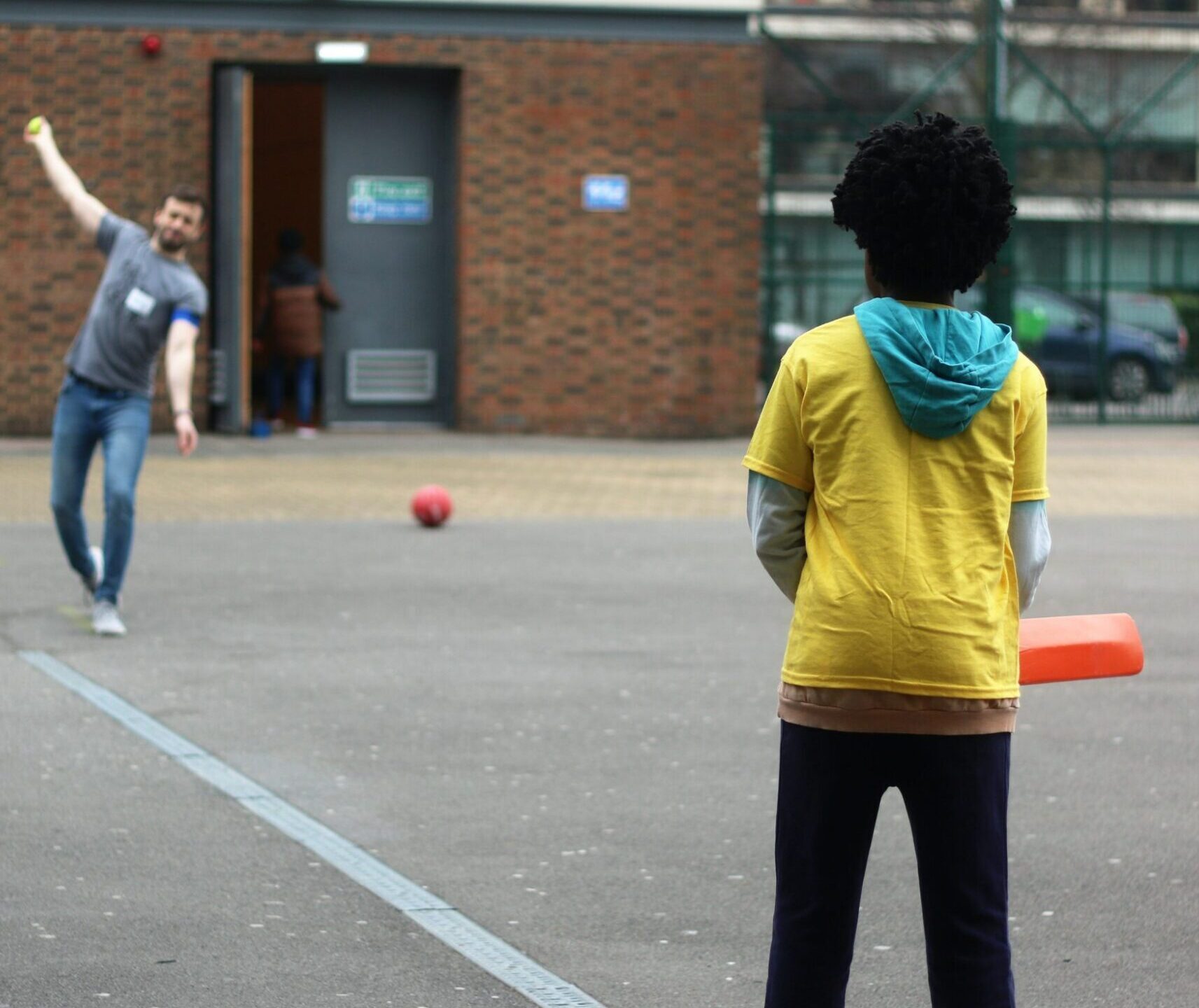 Child playing cricket