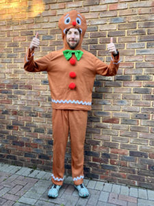 Ralph posing in his gingerbread man costume