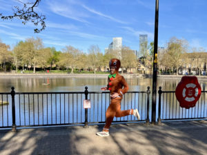Ralph running in his gingerbread man costume