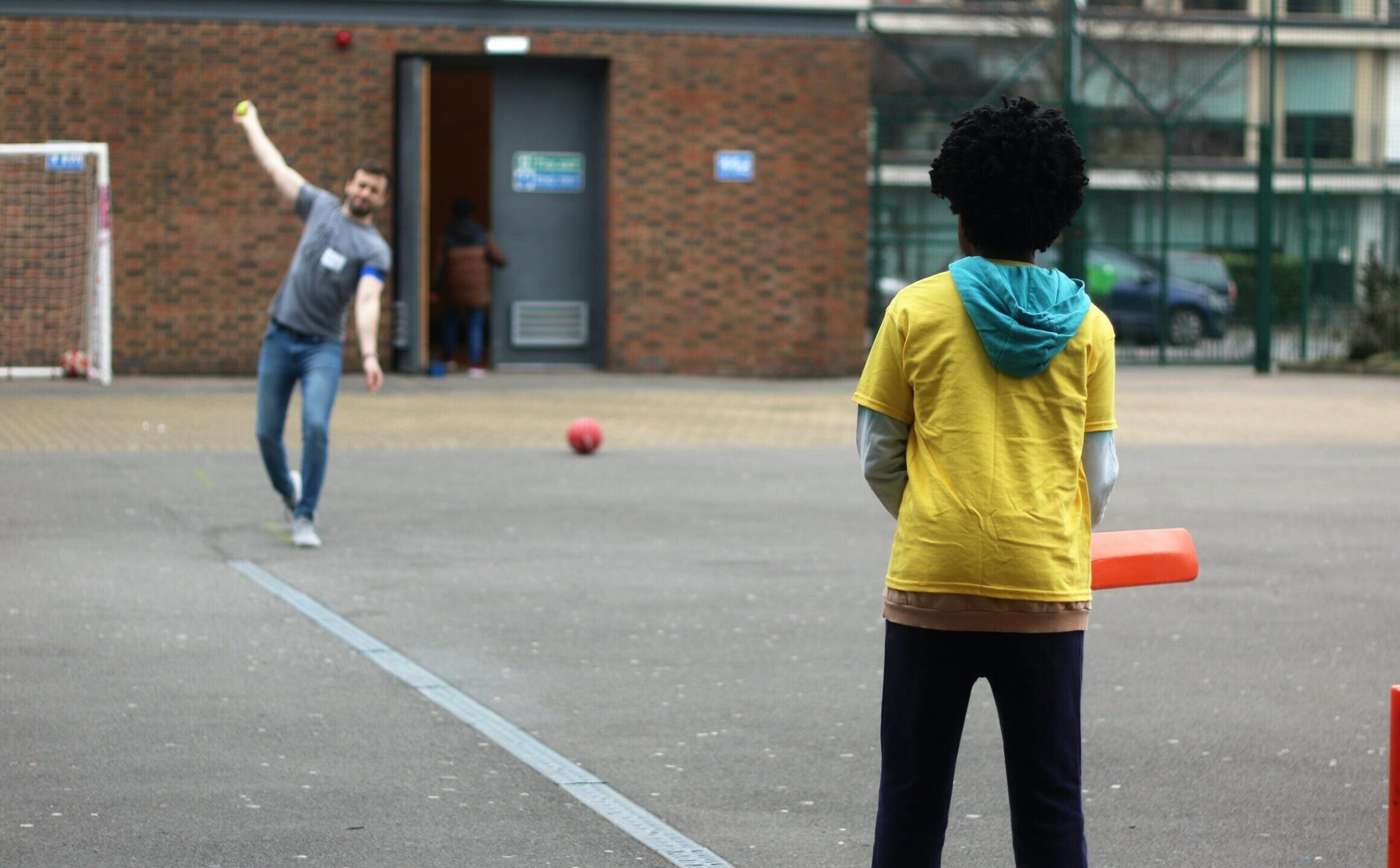 Child playing cricket