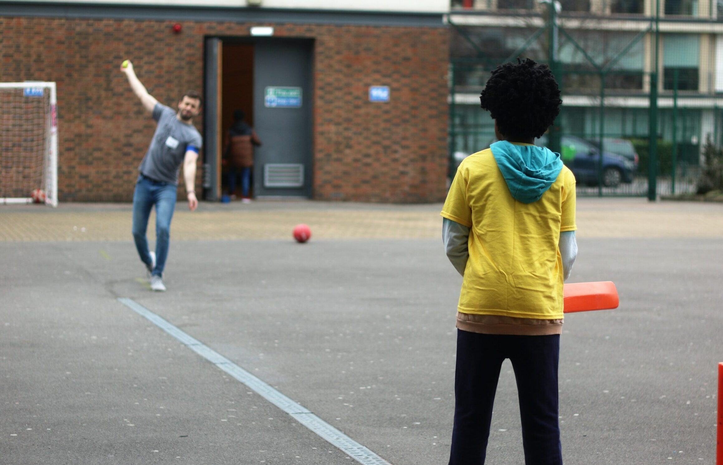Child playing cricket