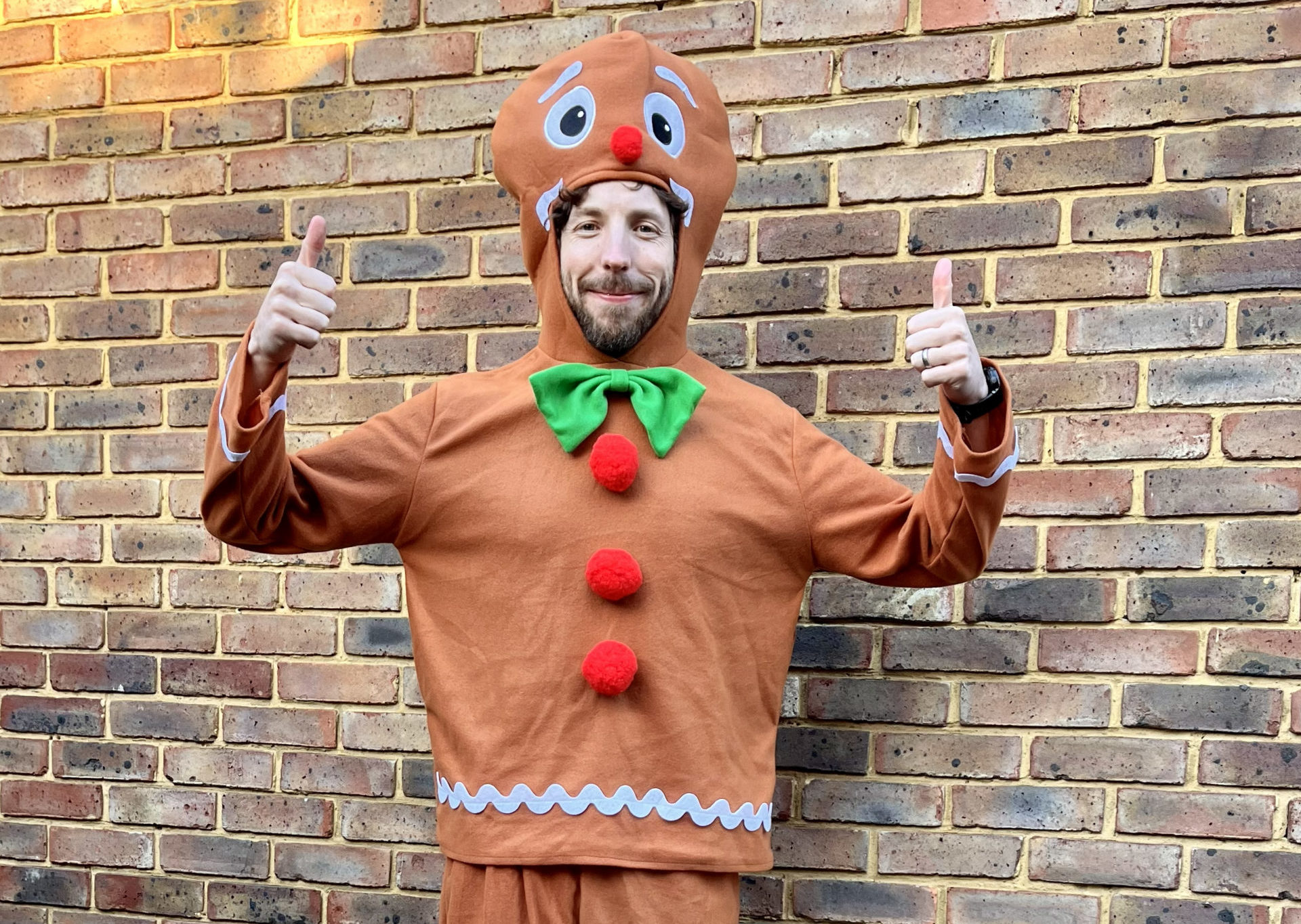 Ralph posing in his gingerbread man costume
